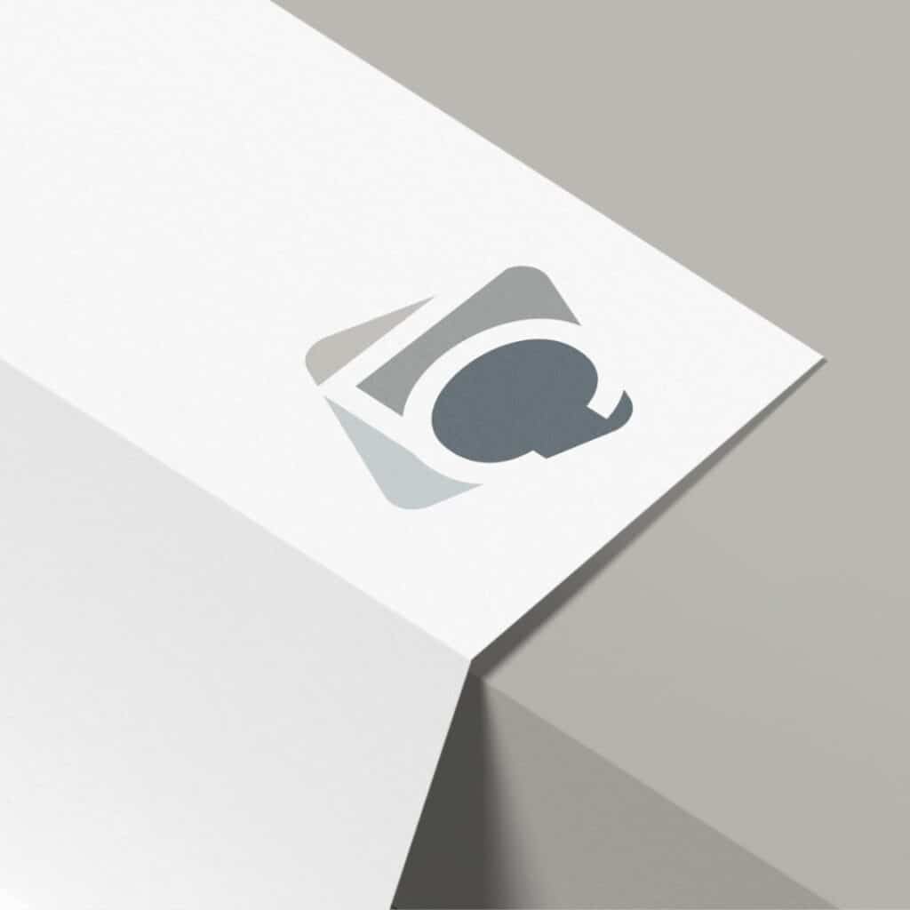 A minimalist white paperdisplaying a stylish logo, emphasizing a refined letterhead design.