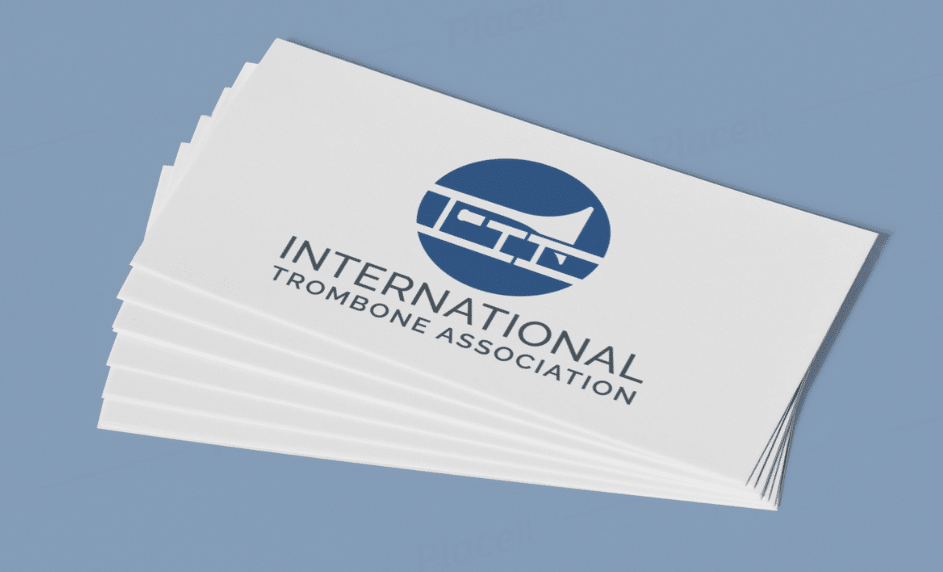 A stack of white cards with a blue logo featuring a trombone and the text INTERNATIONAL TROMBONE ASSOCIATION on a light blue background.