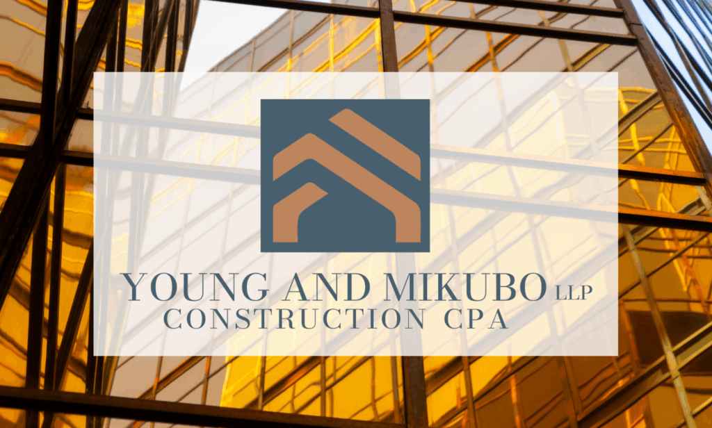 Logo for Young and Mikubo LLP Construction CPA, specialists in construction accounting and branding, overlaid on modern glass buildings in Santa Rosa with warm yellow-orange reflections. The logo uses gold and gray geometric rooftop shapes.