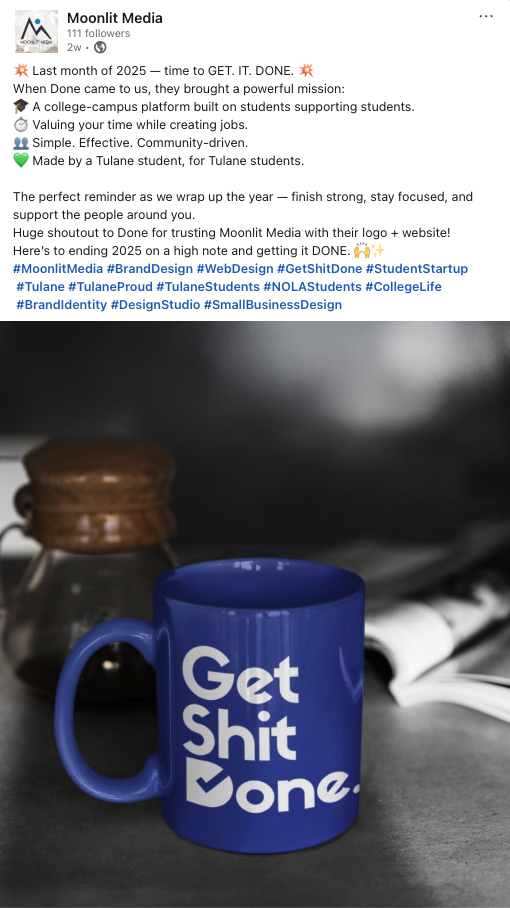 How to Turn 2025 Highlights into 2026 Marketing Content. A blue coffee mug with white text reading “Get Shit Done” sits on a wooden table—a perfect accent for brainstorming 2025 highlights or new marketing strategies. The mug is the focus, with a blurred background of indoor furniture and soft lighting.