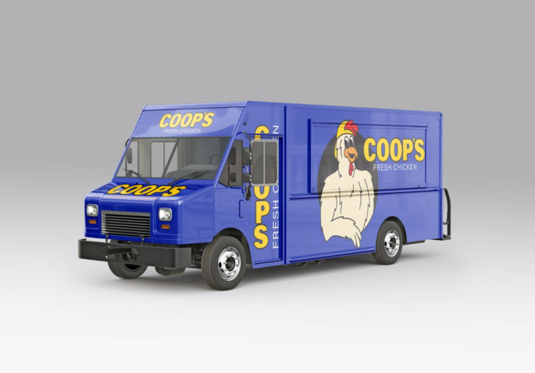 A blue food truck with “COOPS Fresh Chicken” and a large cartoon chicken graphic, showcasing a playful logo design. Perfect inspiration for logo design services, set against a plain gray background.