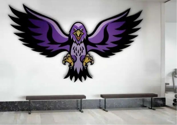 A large, stylized purple and black hawk mascot with outstretched wings is painted on a white wall above two simple benches in a modern indoor space, adding custom illustration flair for standout brands.