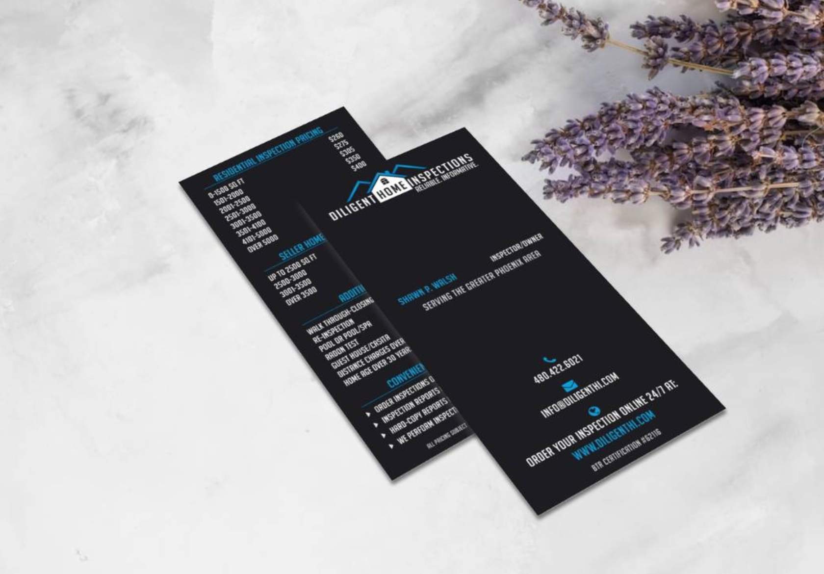 Two black business flyers for Diligent Home Inspections, designed by Moonlit Media, feature white and blue text on a white marble surface beside a sprig of lavender. The flyers highlight services, contact info, and company branding.