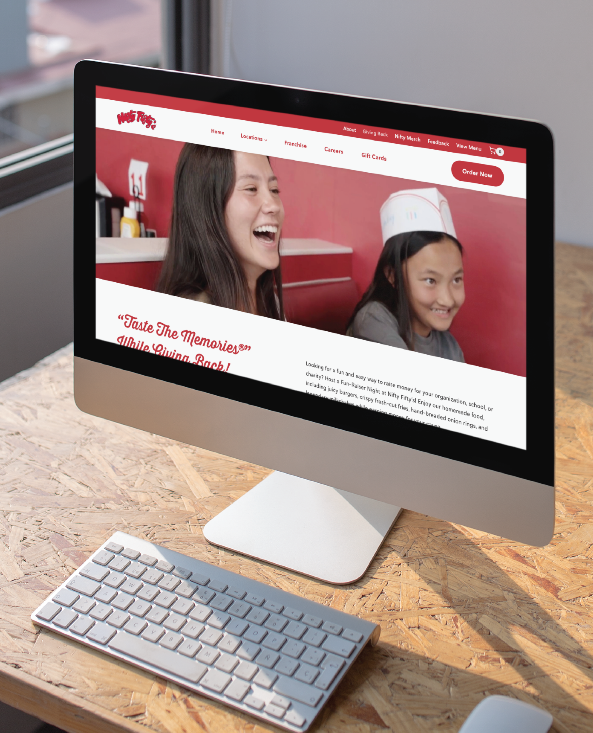 custom-designed-website-for-restaurant--scaled | Moonlit Media LLC A desktop computer on a wooden desk displays a Website Redesign for a restaurant, featuring two smiling girls—one in a paper hat—in New Hampshire. The website’s navigation bar with Accounting Support options is visible at the top.