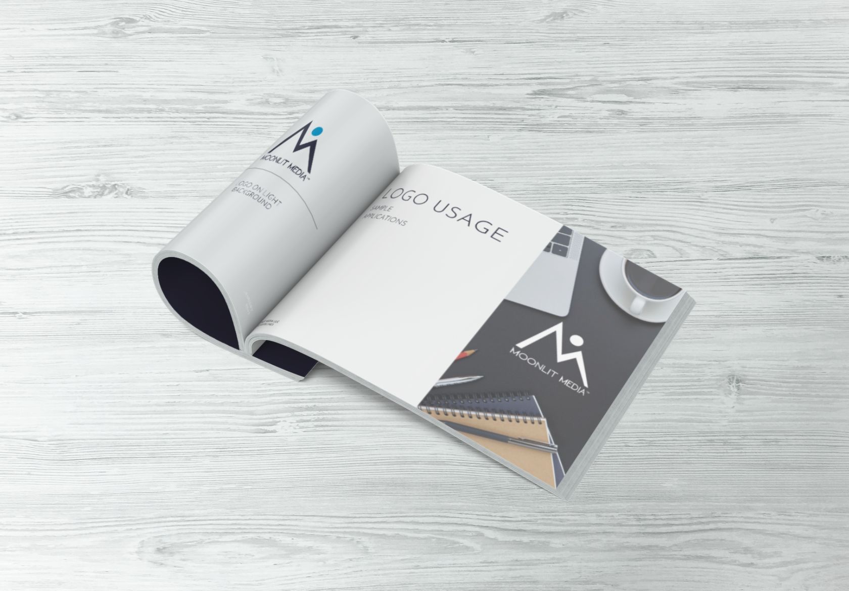 A brand bible mockup rests on a wooden table, encouraging you to seize control of your branding today.