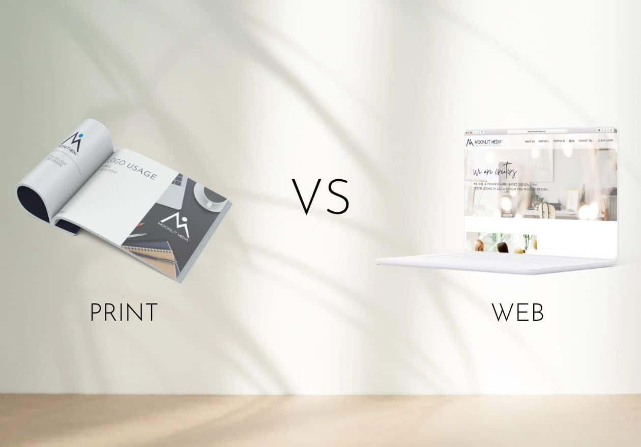 A booklet labeled PRINT is shown on the left, and an open laptop displaying a website labeled WEB is on the right. The text VS appears between them, highlighting Moonlit Media's expertise in web design services and print solutions.