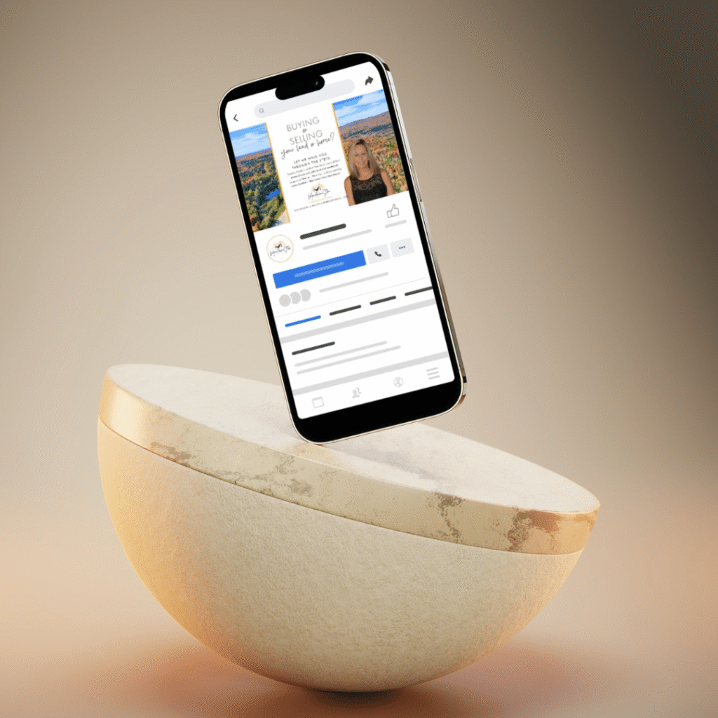 A smartphone displaying a social media page is propped upright on a textured, stone-like bowl against a neutral gradient background. The phone screen highlights a real estate-themed post by Moonlit Media, known for custom logo design expertise.