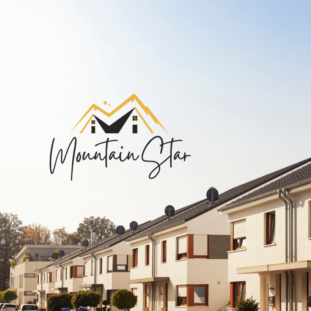 A row of modern, white two-story townhouses under a clear blue sky, with the Mountain Star logo featuring stylized mountains and stars above the rooftops—perfect inspiration for web designers seeking custom website design ideas.