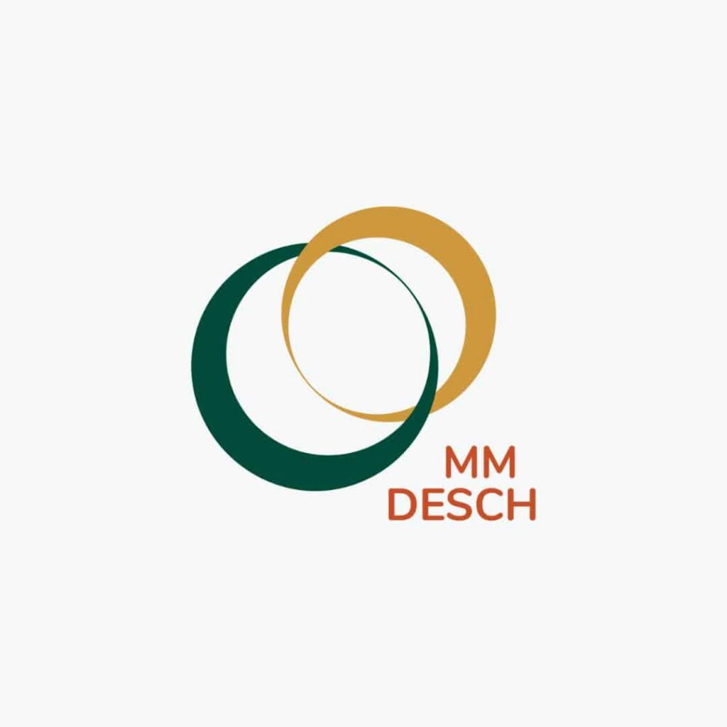 | Moonlit Media LLC Two interlocking rings, one dark green and one gold, overlap on a white background. The text MM DESCH appears in orange to the lower right, hinting at expert web design services and creative custom website design solutions.