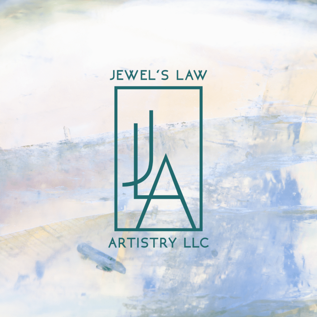Custom logo design for Jewel’s Law Artistry LLC featuring stylized JLA initials inside a rectangle, set against a pastel abstract watercolor background—crafted by Moonlit Media, your trusted web designer.