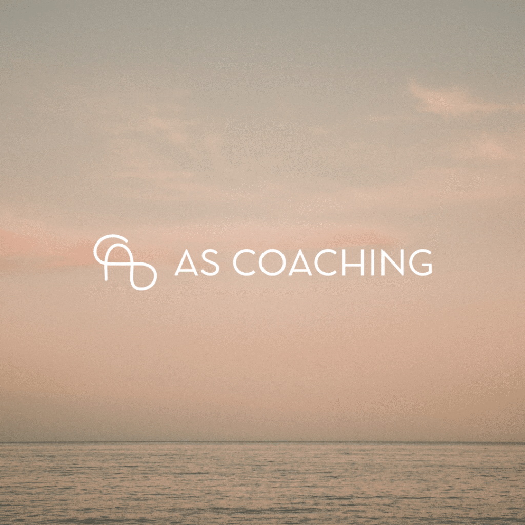 Minimalist image with a calm ocean under a pastel sunset sky. In the center, a white AS COACHING logo and text, showcasing custom website design and logo design services in a simple, abstract style to the left of the text.