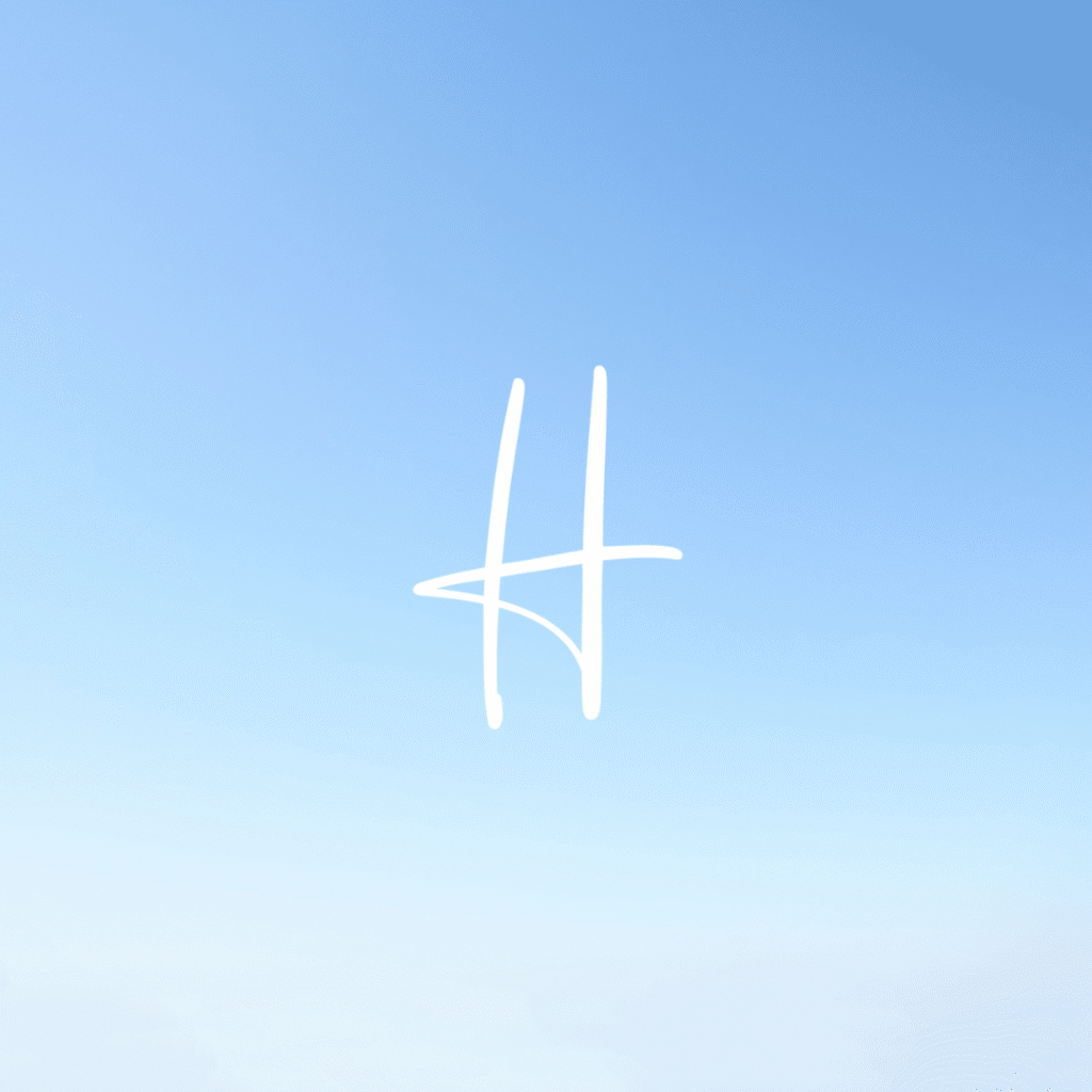 A white, handwritten-style letter H is centered on a gradient blue background that fades from deeper blue at the top to lighter blue at the bottom, showcasing Moonlit Media’s expertise in logo design services.