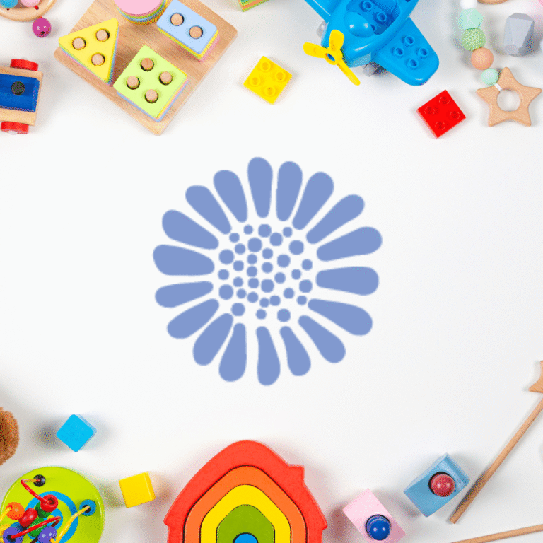Colorful childrens toys arranged around the border of a white surface with a blue abstract flower-like logo in the center, highlighting Moonlit Media’s creative approach to custom website design.