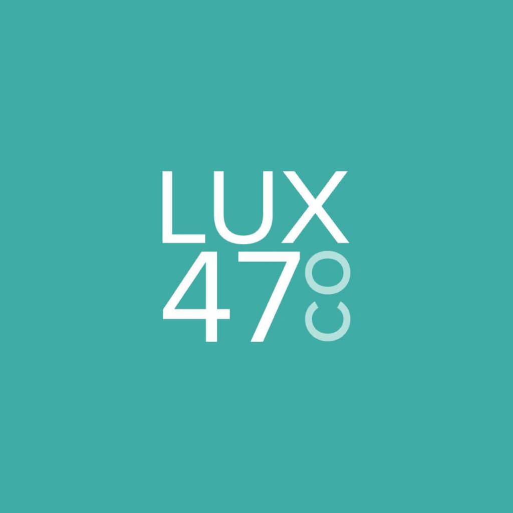 | Moonlit Media LLC White text on a teal background reads LUX 47° Cº with the Cº slightly tilted. The minimalist, centered design reflects Moonlit Media’s custom website design expertise.