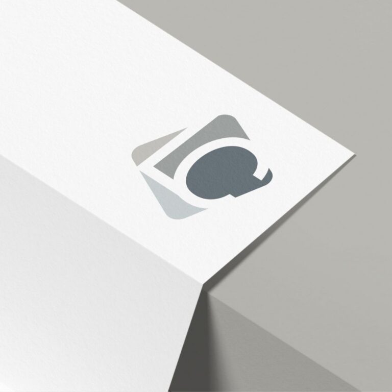 A minimalist white paperdisplaying a stylish logo, emphasizing a refined letterhead design.