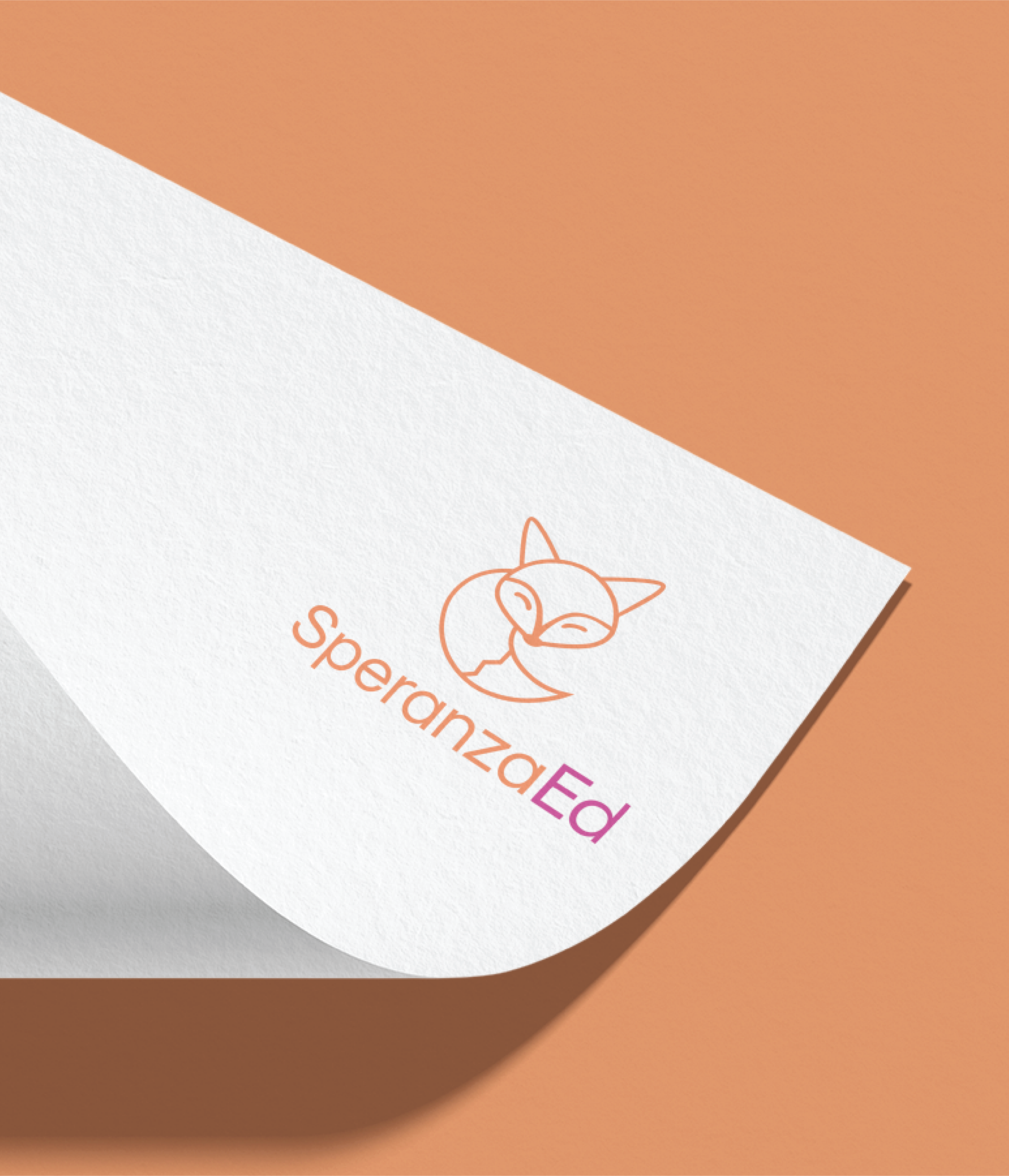 A sheet of white paper with the SperanzaEd logo, ideal for educational consultants, featuring an outline of a fox above the text. The branding uses a color transition from orange to pink and rests on a peach-colored surface.