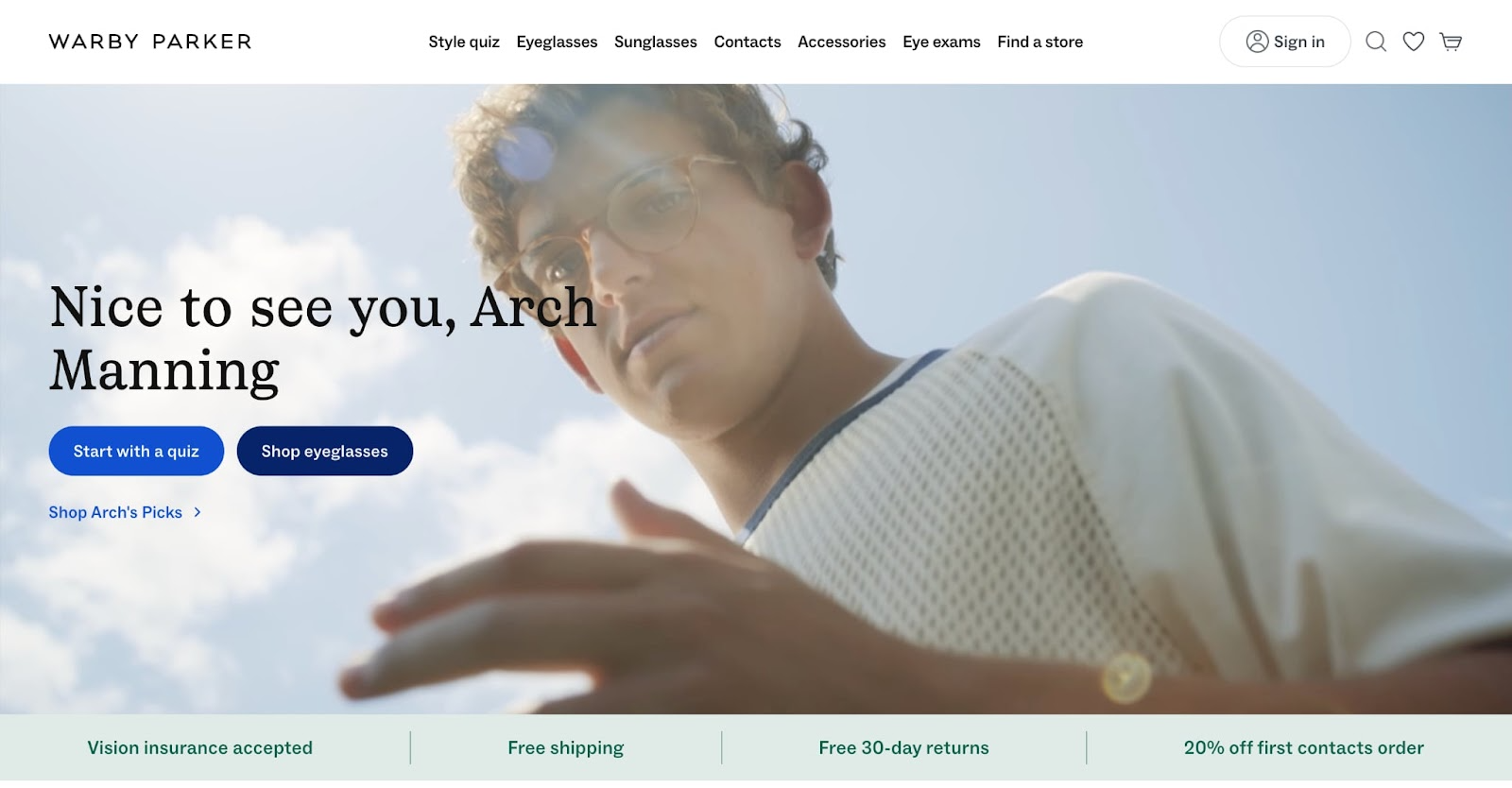 A young man with short curly hair and glasses looks down at the camera with one hand slightly raised. The sky is blue and sunny. A custom website design inspired by the Warby Parker interface surrounds the image, with navigation and promotional banners visible.