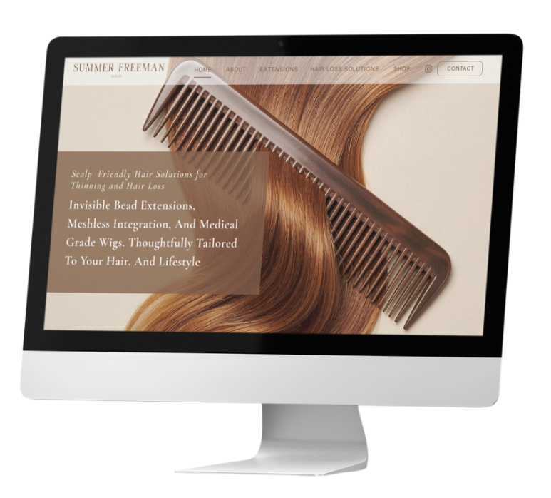 A computer monitor displays a Hair Salon Website with a large brown comb resting on smooth, light brown hair. The site showcases hair loss solutions and extensions, featuring sleek website design, a navigation menu, and text about their services.