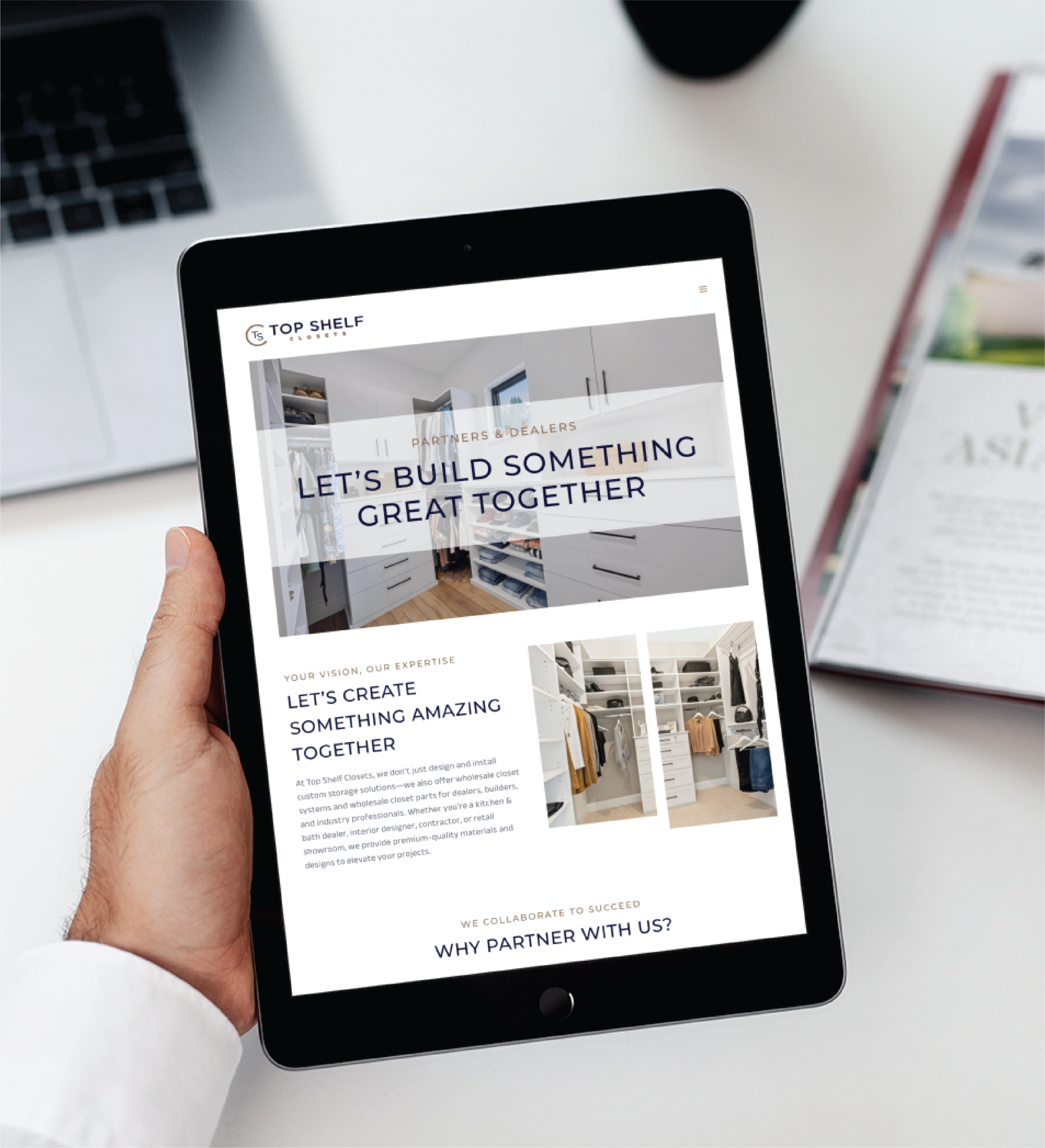 A person holds a tablet displaying a web design for a beauty salon with the headline "Let's Build Something Great Together" and images of organized closets. A laptop and magazine rest on the table in the background, evoking style in South Carolina.