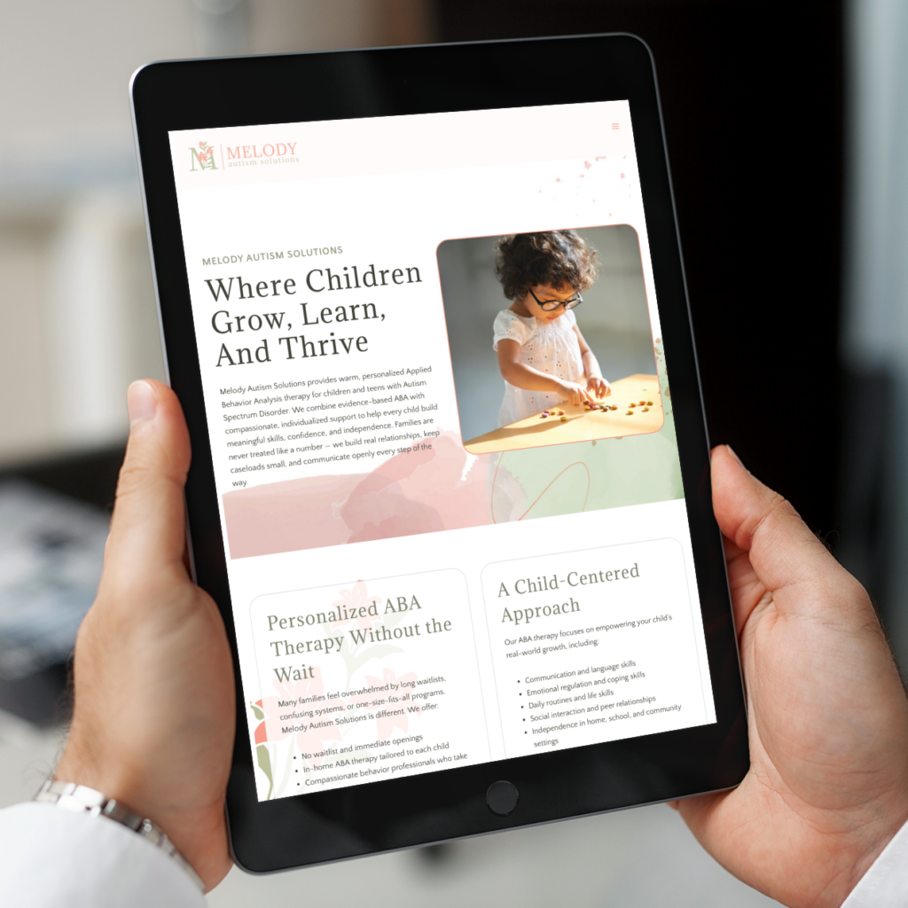 A person holds a tablet displaying a custom website design for Melody Autism Solutions, featuring an article titled Where Children Grow, Learn, And Thrive and highlighting resources for ABA therapists in New York.