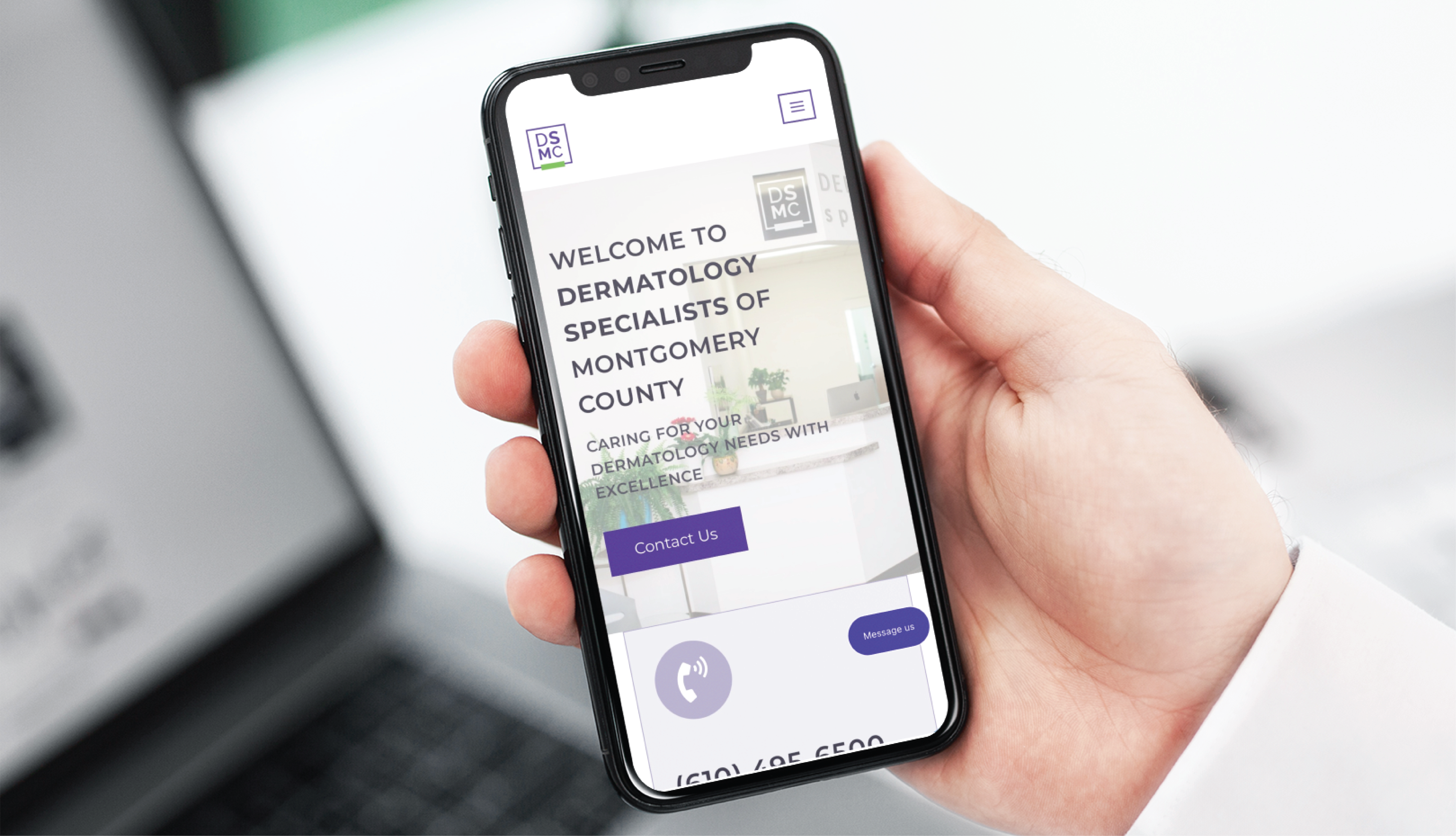 A hand holding a smartphone displays the website design for Dermatology Specialists of Montgomery County, a leading medical practice in Pennsylvania, featuring a welcome message and contact information.