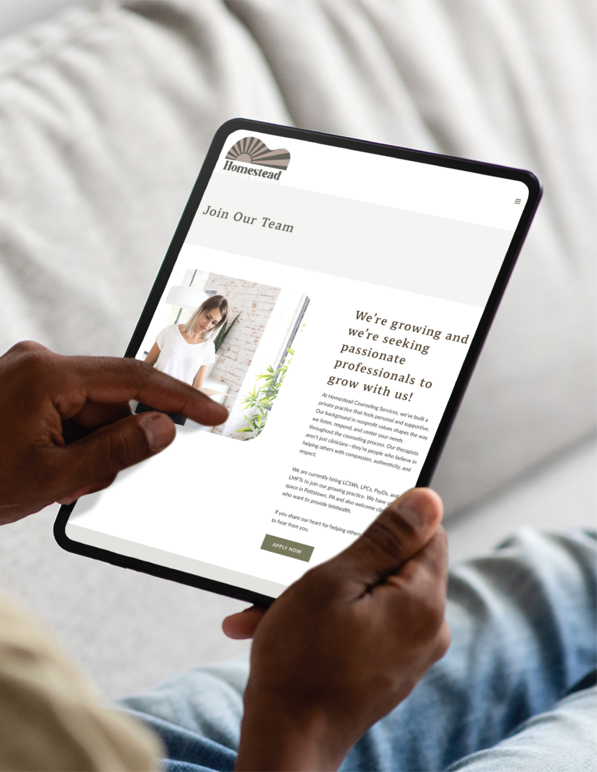 A person holds a tablet displaying Homestead’s Join Our Team webpage, featuring a smiling woman and text about seeking passionate Home Organization professionals to join their growing team in Pennsylvania.