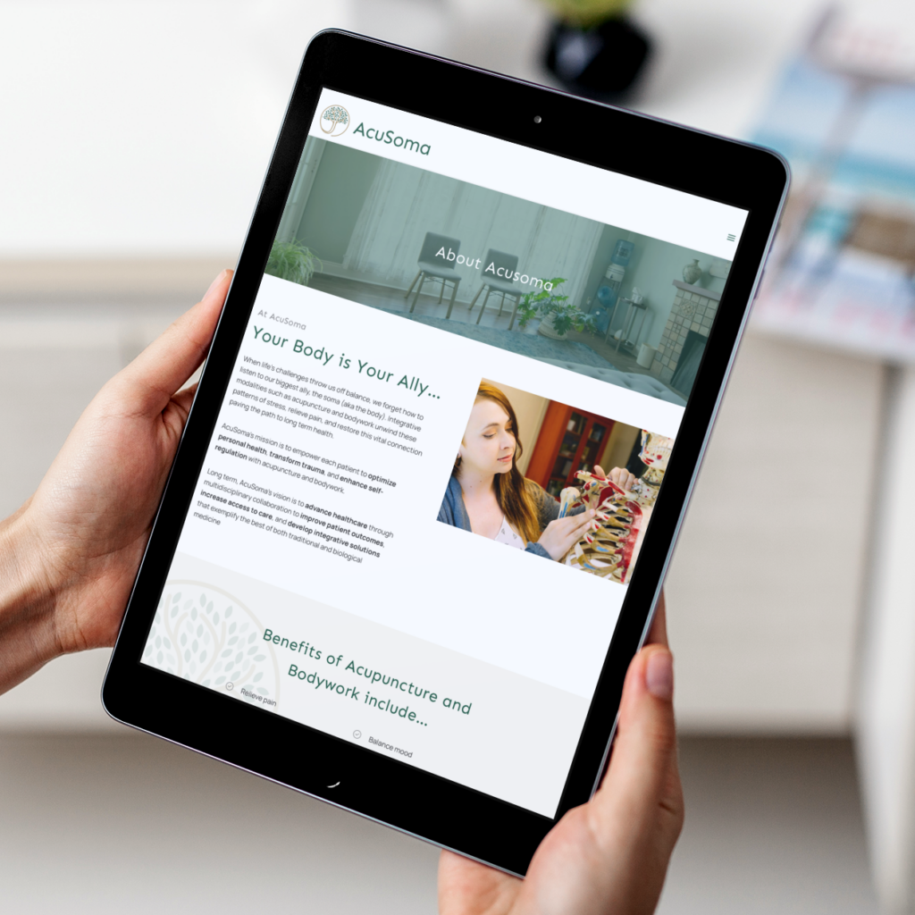 A person holds a tablet displaying the AcuSoma website, highlighting this California wellness practice with information on acupuncture, bodywork benefits, a photo of a woman with an anatomical model, and soothing website design elements in the header.