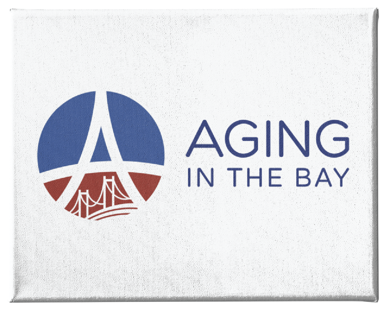 Logo with a blue and red circle featuring a stylized letter A and a bridge, inspired by Montana landscapes. To the right, the text reads AGING IN THE BAY on a white background, showcasing thoughtful logo design.