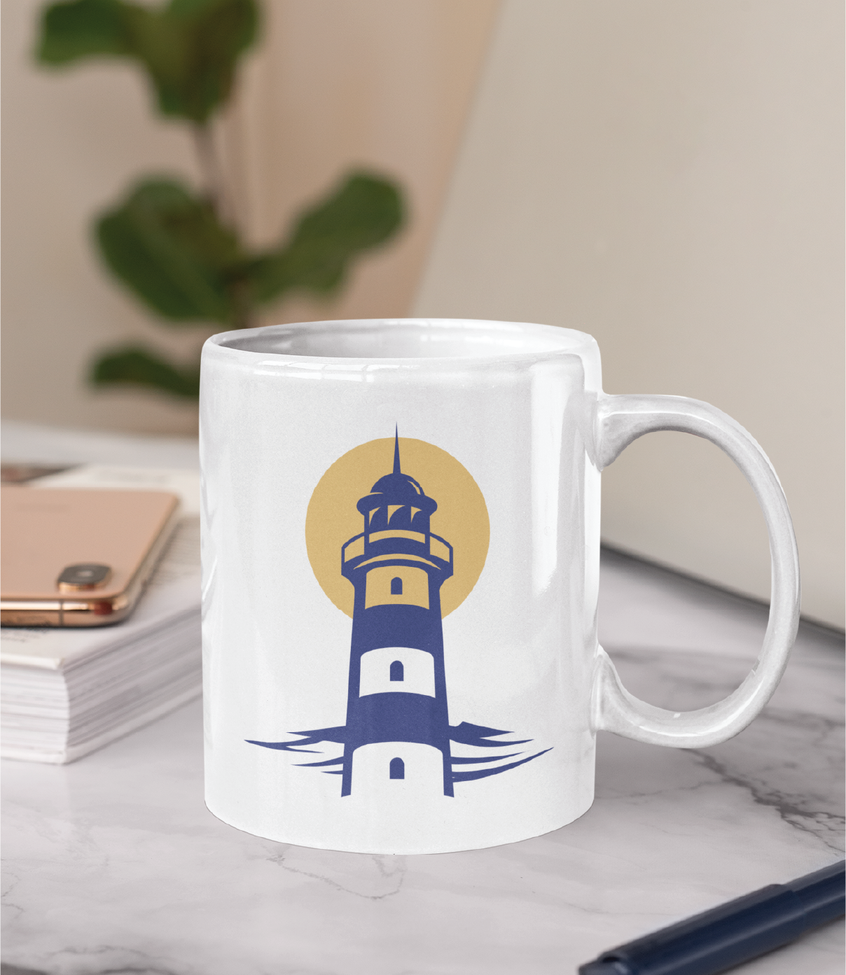 A white ceramic mug featuring a blue lighthouse and yellow sun logo design sits on a marble surface near a smartphone, notebook, and plant.