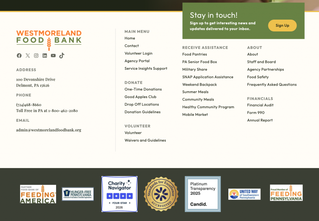 Westmoreland Food Bank contact info, website menu, volunteer info, and logos of partners and certifications are all conveniently displayed as customer resources within the website footer. A green section at the top right invites users to stay in touch for updates. The clean white and beige background supports effective website optimization while ensuring important details remain accessible.