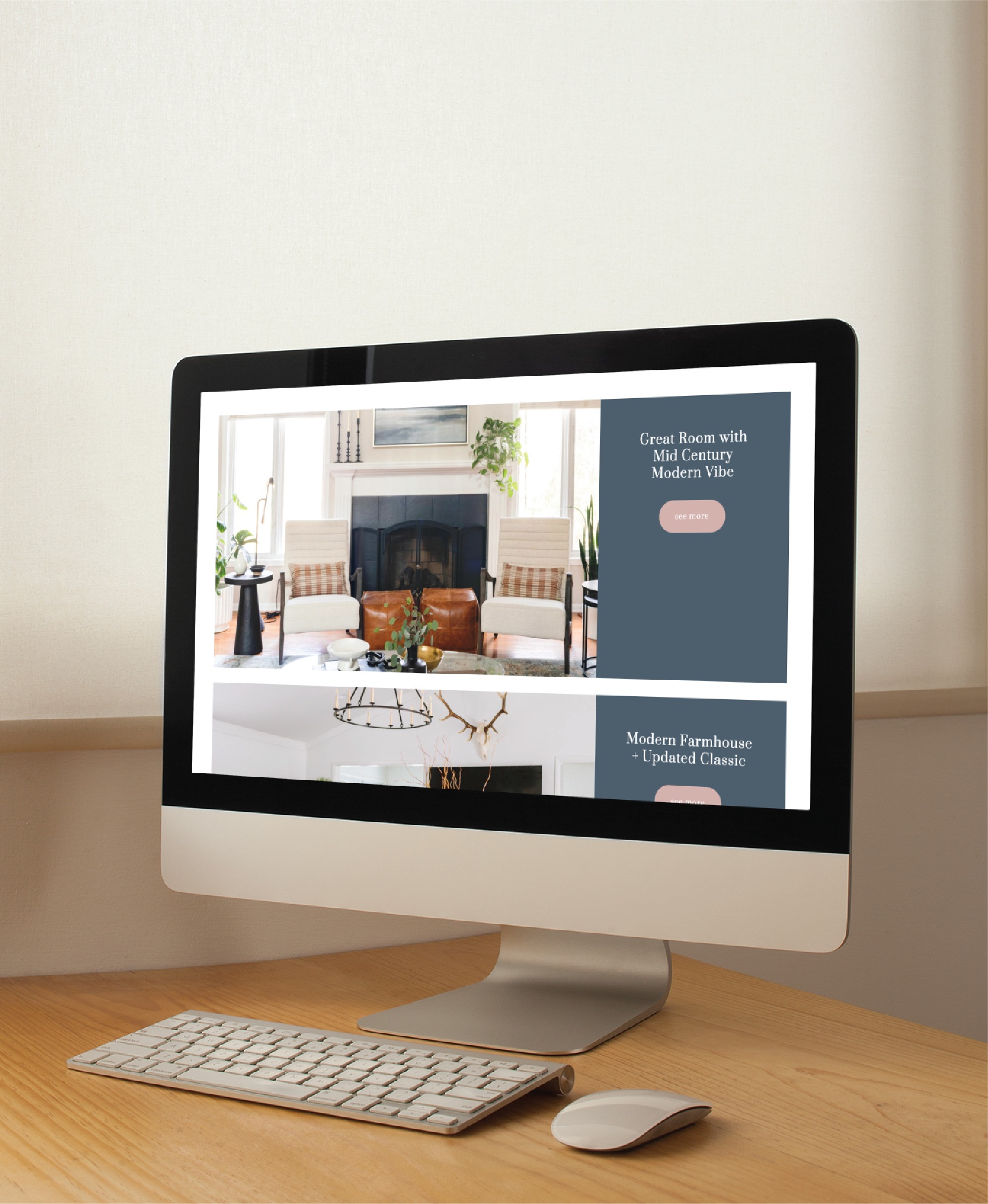 A desktop computer on a wooden desk displays a home decor website featuring modern living room designs, showcasing sleek web design. A white keyboard and mouse sit in front of the monitor, with a window covered by a white blind in the background.