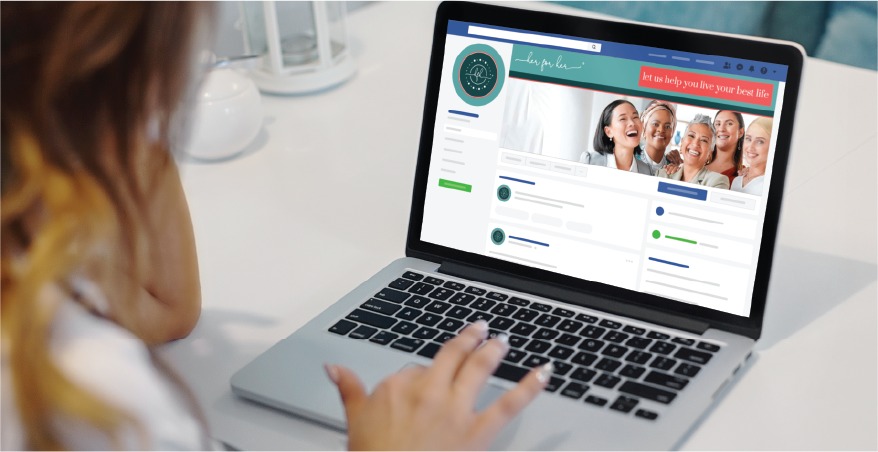 A person uses a laptop displaying a social media profile page featuring a banner photo of smiling women, a logo, text, and various posts for a Pennsylvania skincare brand.
