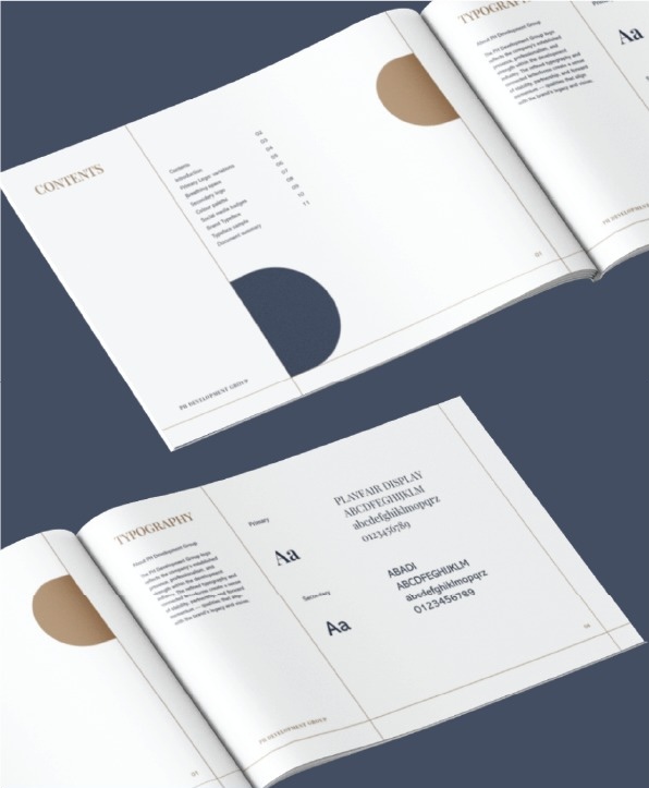Two open booklets with minimalist designs lie on a dark surface. Pages show table of contents, typography samples, and geometric shapes in beige and blue—perfect inspiration for stationery design or creative branding projects in Ohio.