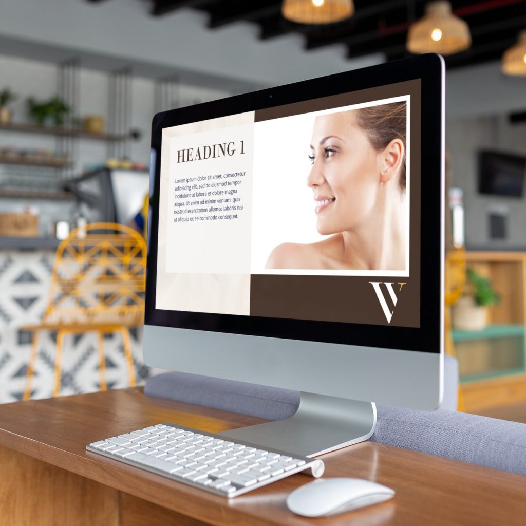 A desktop computer displays a website with a woman’s profile photo, a heading, and text—featuring modern social media design elements. The computer is on a desk in a stylish Indiana workspace, with shelves and chairs in the background, creating an inviting environment ideal for an accounting service.