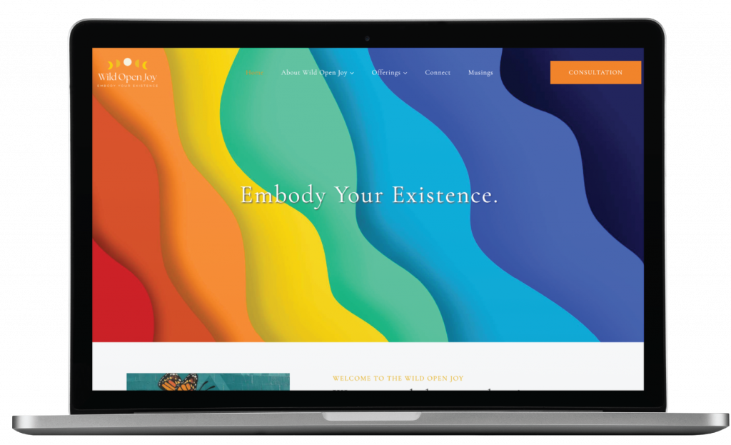 A laptop displays a colorful website with wavy rainbow lines and the text Embody Your Existence at the center, capturing the essence of a Spiritual Therapist in Colorado. A menu bar and a bright orange Consultation button appear at the top, reflecting thoughtful website design.