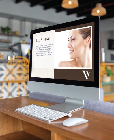 A computer on a wooden desk displays a presentation slide featuring a woman’s photo and text about an Accounting Service. A keyboard and mouse sit in front, while the modern cafe setting in the background adds to the professional yet inviting atmosphere—perfect for discussing social media design strategies or networking with Indiana professionals.
