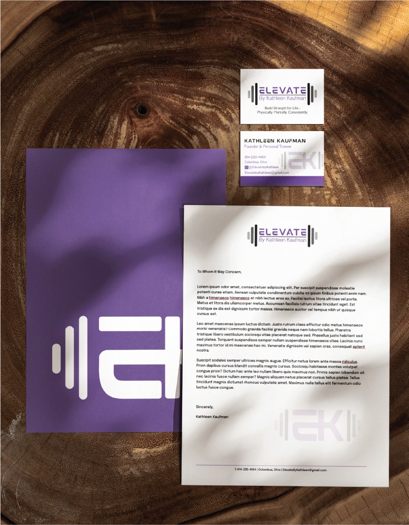 Elevate by Kathleen Kaufman branding materials on wood: a purple folder, a white letter with logo, and two business cards featuring a purple dumbbell graphic and contact info. This stationery design perfectly reflects the professionalism of an Ohio-based personal trainer.
