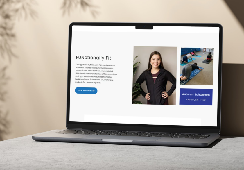 A laptop on a desk displays a website for FUNctionally Fit, featuring a female trainer, Autumn Schramm, her photo, workout images, and a Book Appointment button—showcasing strong website credibility through its professional design and clear presentation.