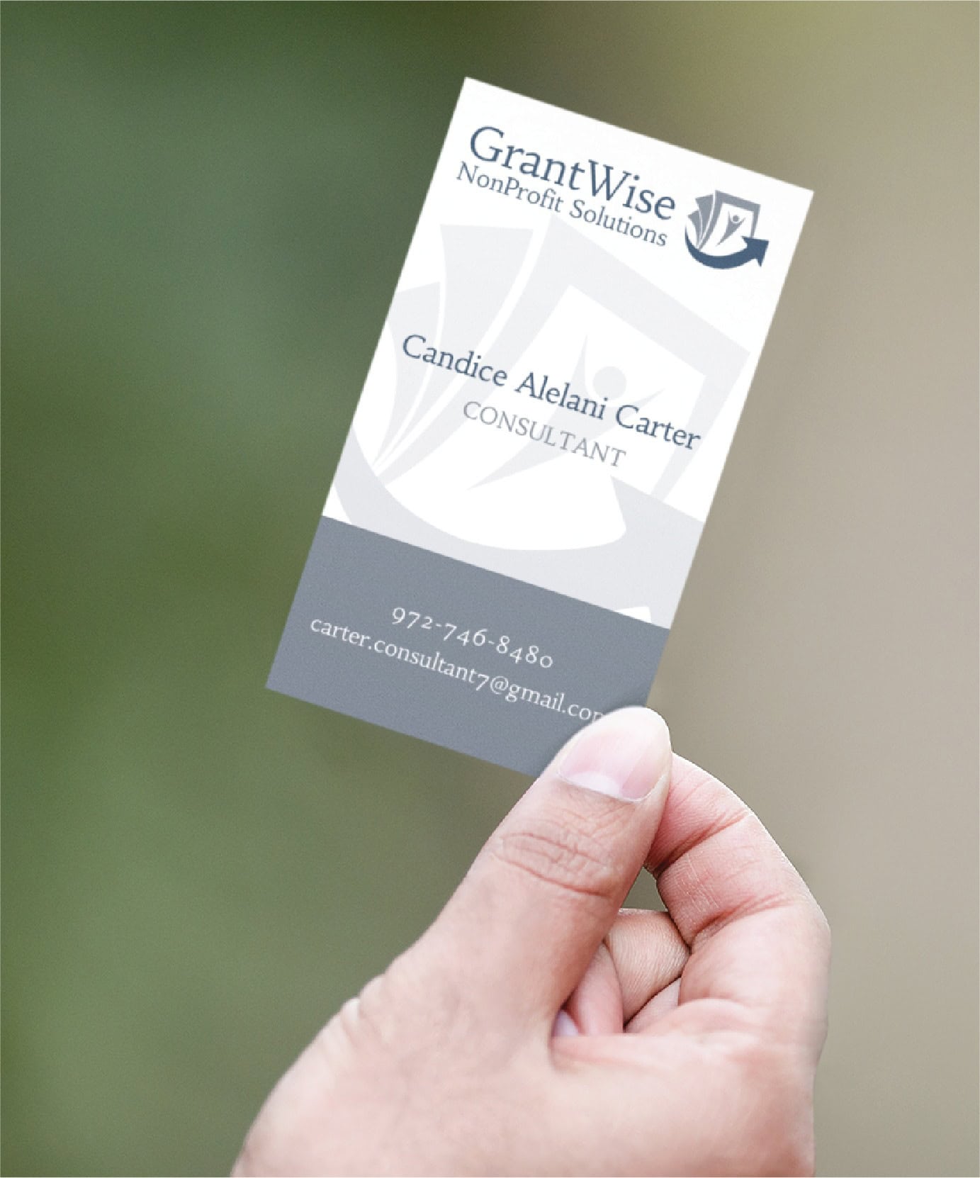 A hand holds a business card for GrantWise NonProfit Solutions, showcasing the name Candice Alelani Carter, Consultant, specializing in move management across Pennsylvania. The card displays a phone number and email on a blurred background, highlighting sleek print design.