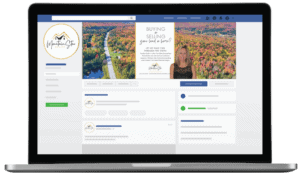 A laptop displays a Facebook business page for Mountain City Realty, featuring a fall landscape cover photo reminiscent of Michigan’s scenic beauty, a realtor’s photo, and text about buying or selling homes. The layout shows typical Facebook profile elements with touches of custom social media design.
