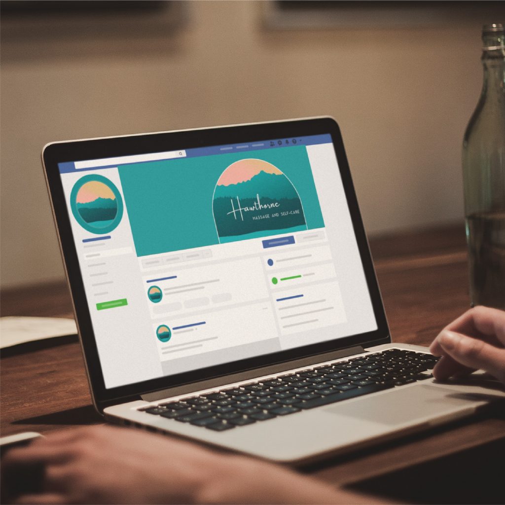 A person uses a laptop displaying a social media profile with a nature-themed cover image and circular profile picture, highlighting the elegant social media design of a popular skincare brand from Pennsylvania. A glass bottle sits nearby on the wooden desk.