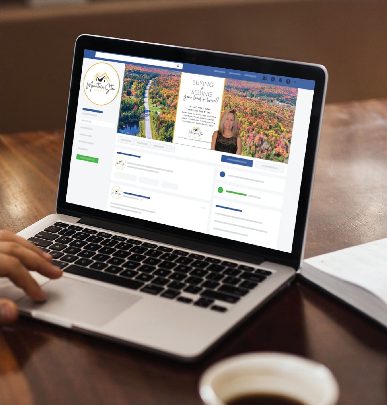 A person uses a laptop displaying a real estate Facebook page with a custom social media design featuring a cover photo of a woman, trees in Michigan’s fall colors, and the words Buying or Selling, you need a real estate agent.