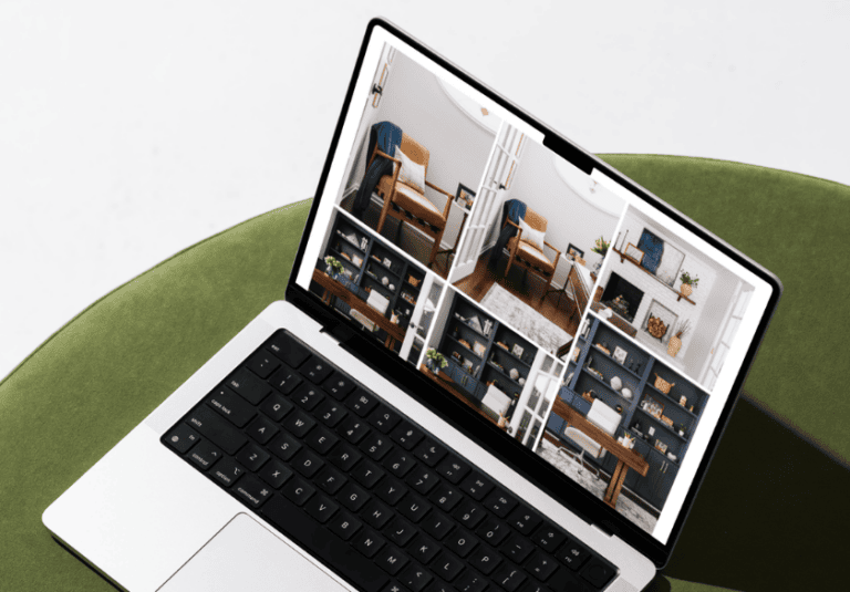A laptop sitting on a green cushion displays a website photo gallery of interior design images featuring home office and living room spaces.