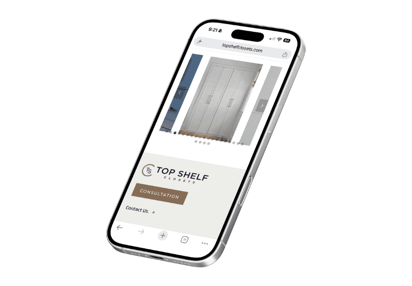 A smartphone displaying the Top Shelf Closets website, which utilizes image gallery optimization to showcase custom closets alongside a consultation button.
