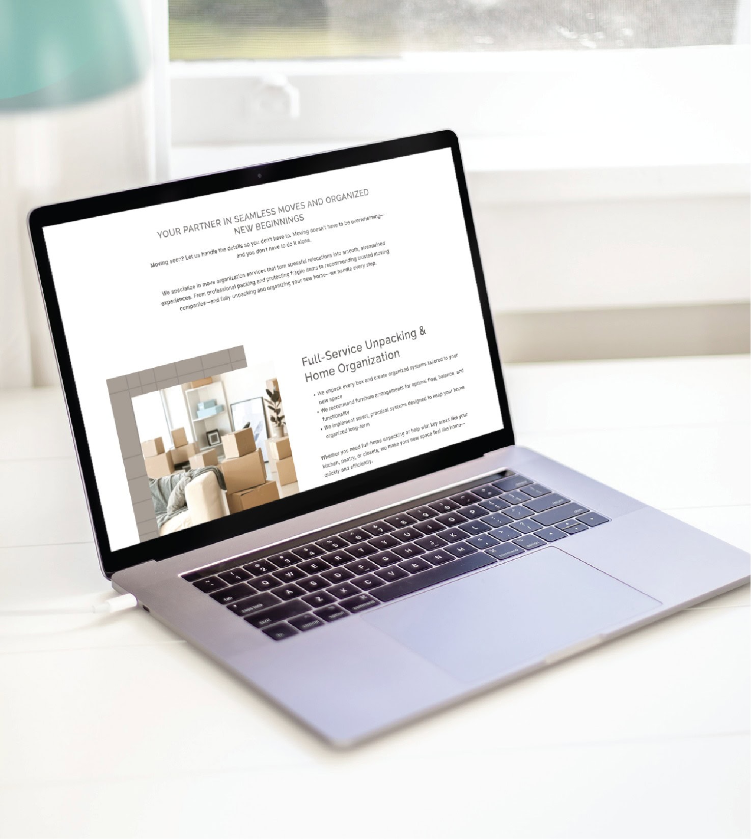 Laptop displaying a professional website for a home organization service, designed through professional website creation.